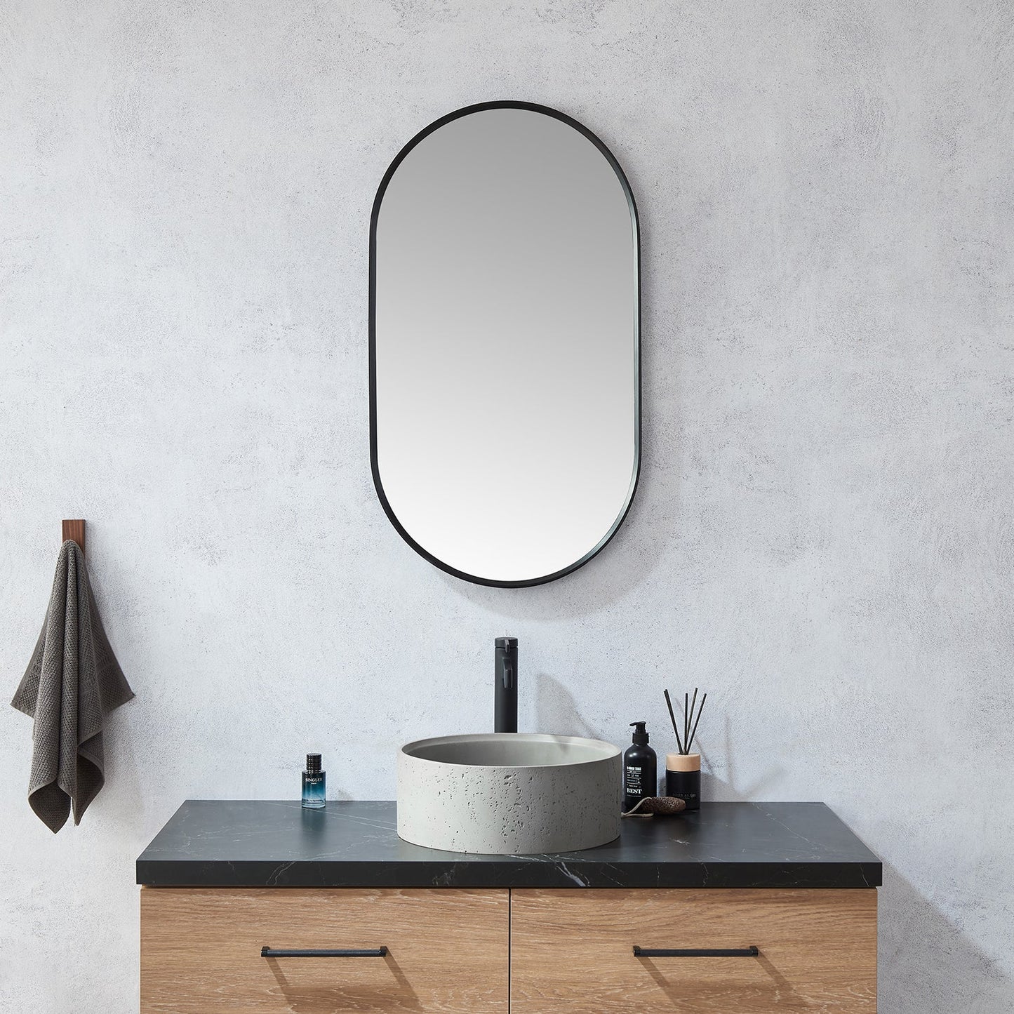 Miajadas 20 in. W x 36 in. H Oval Metal Wall Mirror in Brushed Black