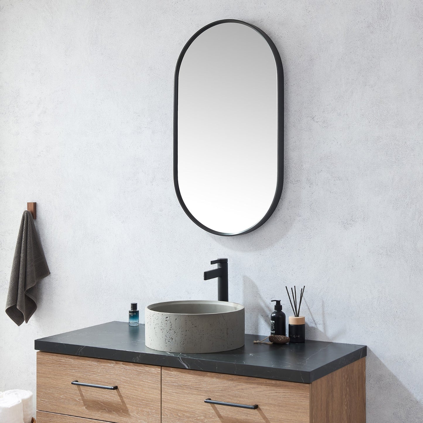 Miajadas 20 in. W x 36 in. H Oval Metal Wall Mirror in Brushed Black