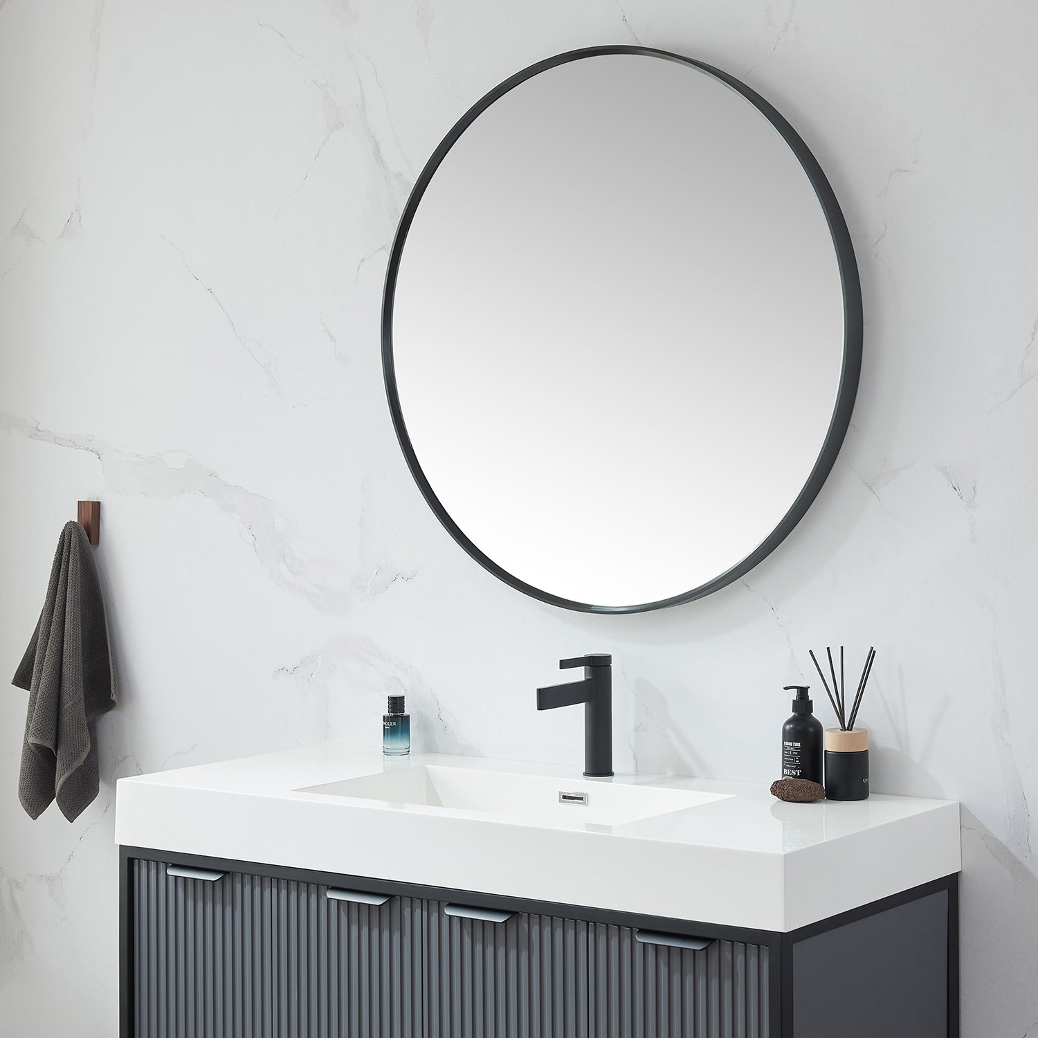 Cascante 35.4 in. W x 35.4 in. H Round Metal Wall Mirror in Brushed Black
